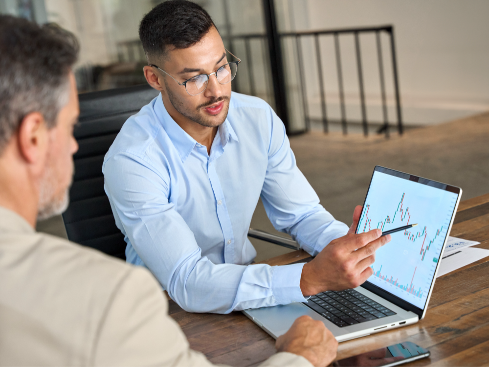Finance team analyzing business data with Enso Analytics dashboards